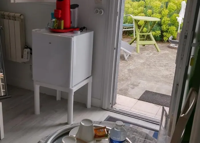 Alojamento de Acomodação e Pequeno-almoço Les Palmiers 3*